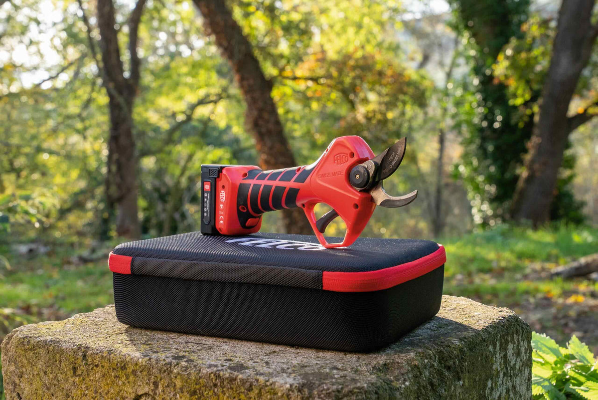 electric pruning shears on a case